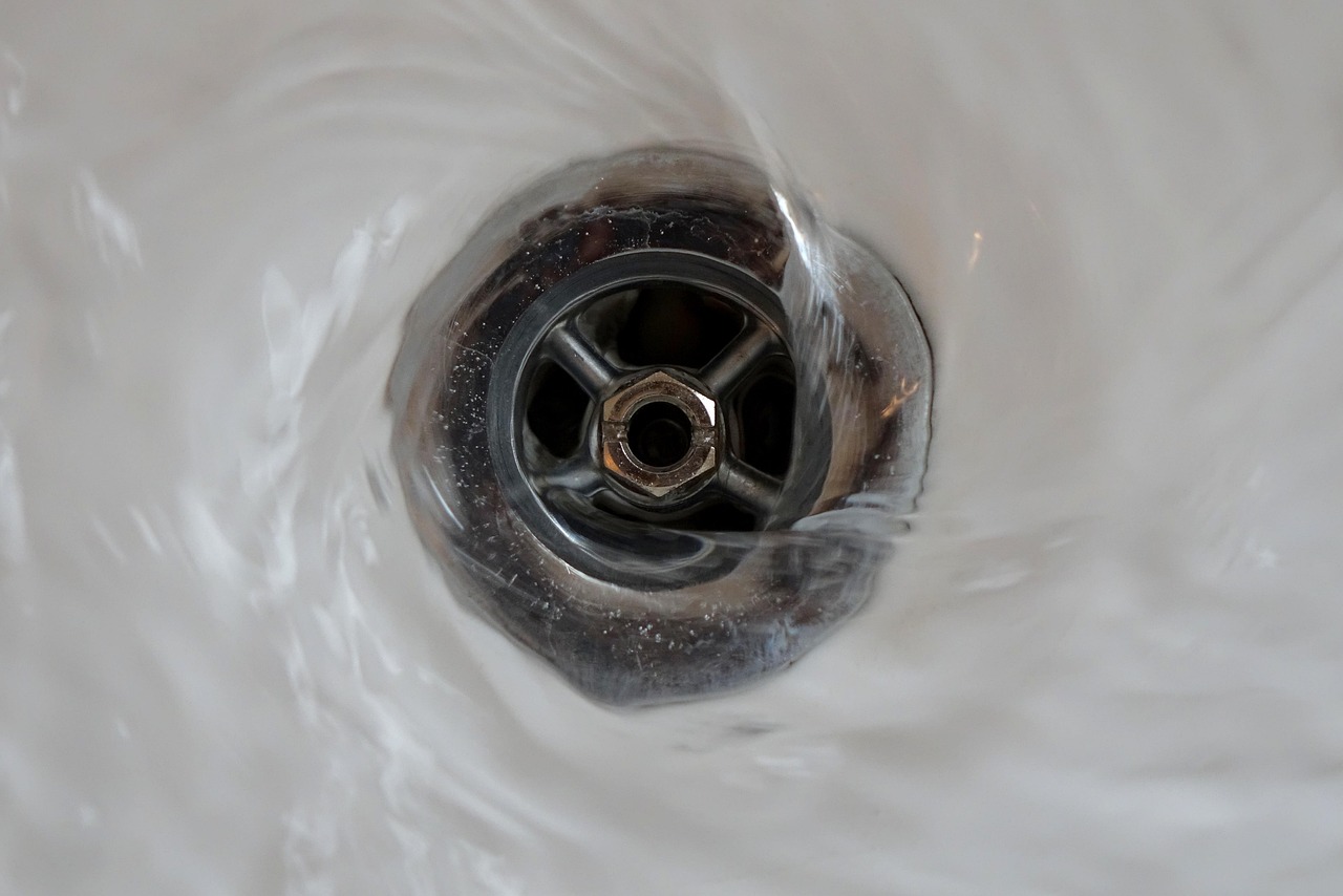 Curbless walk-in shower with large-format porcelain tile and linear drain in Bonita Springs