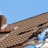 Homeowner documenting hurricane roof damage in Fort Myers Florida