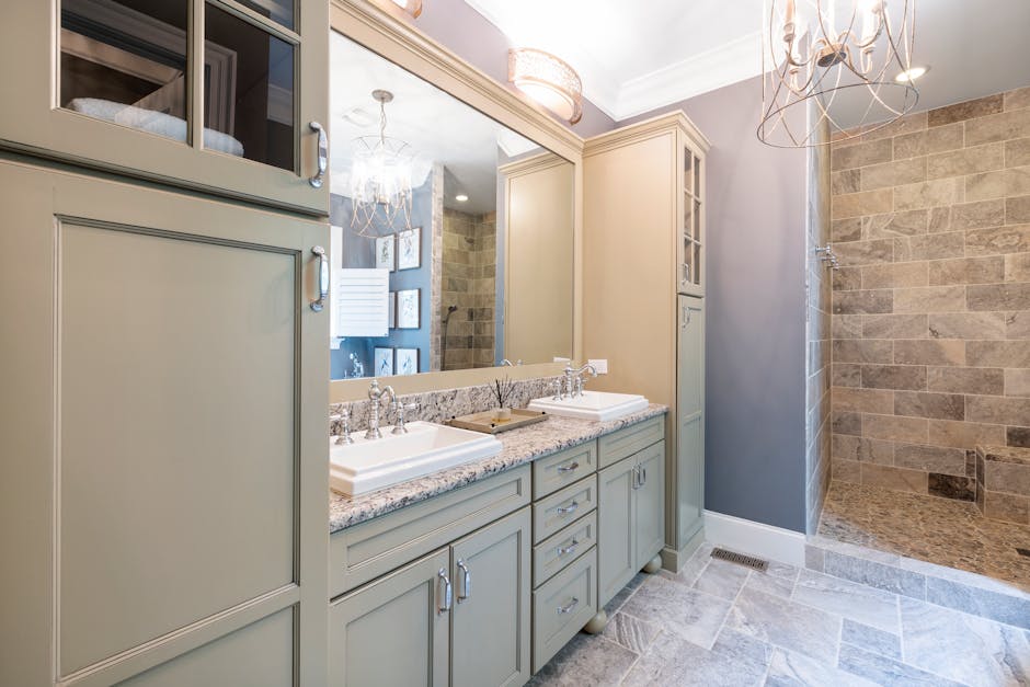 Quartz vanity countertop and semi-custom cabinetry in a Naples Florida bathroom remodel