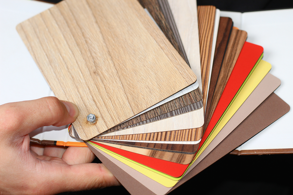 Flooring finish samples for comparing LVP and tile options