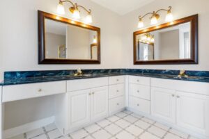 Bathroom vanity with PVC cabinet box and quartz countertop in a Fort Myers home