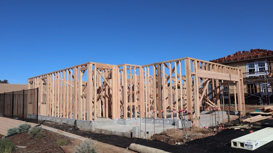 Hurricane-rated aluminum lanai frame under construction in North Fort Myers backyard