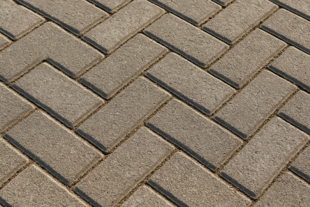 Close-up of interlocking driveway pavers in a pattern