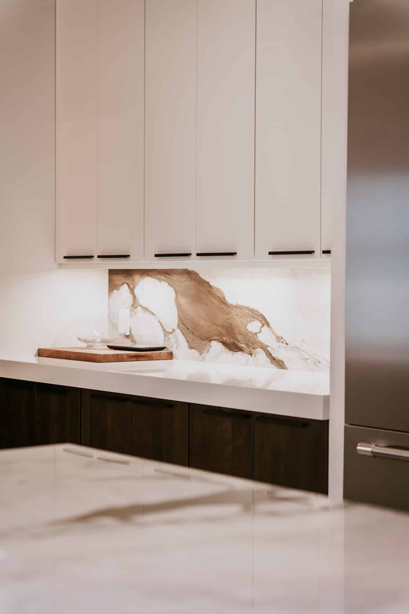 Kitchen: lit onyx backsplash. Alliance Construction remodel, Southwest Florida