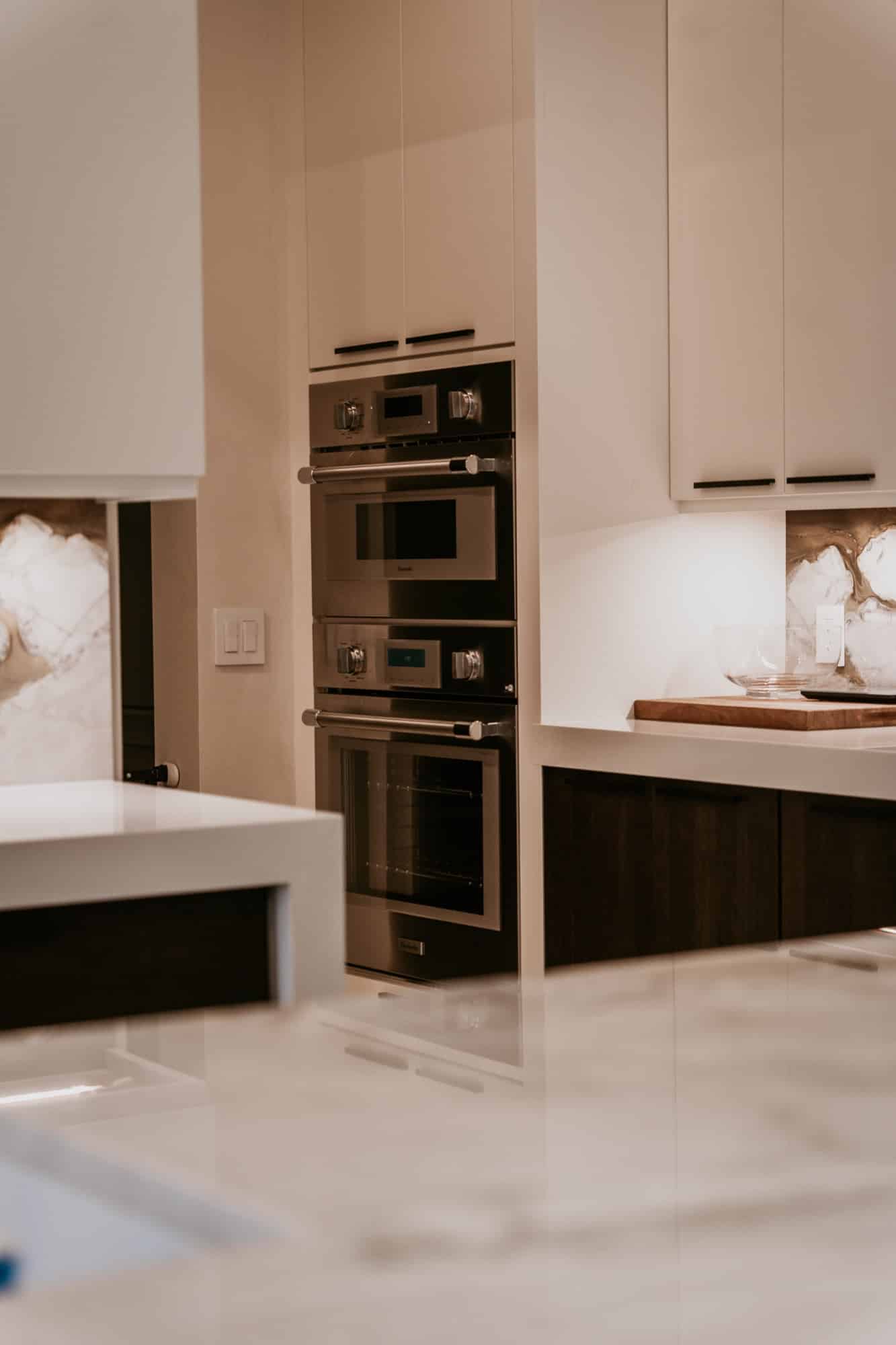 Custom kitchen detail with double wall ovens, Alliance Construction project
