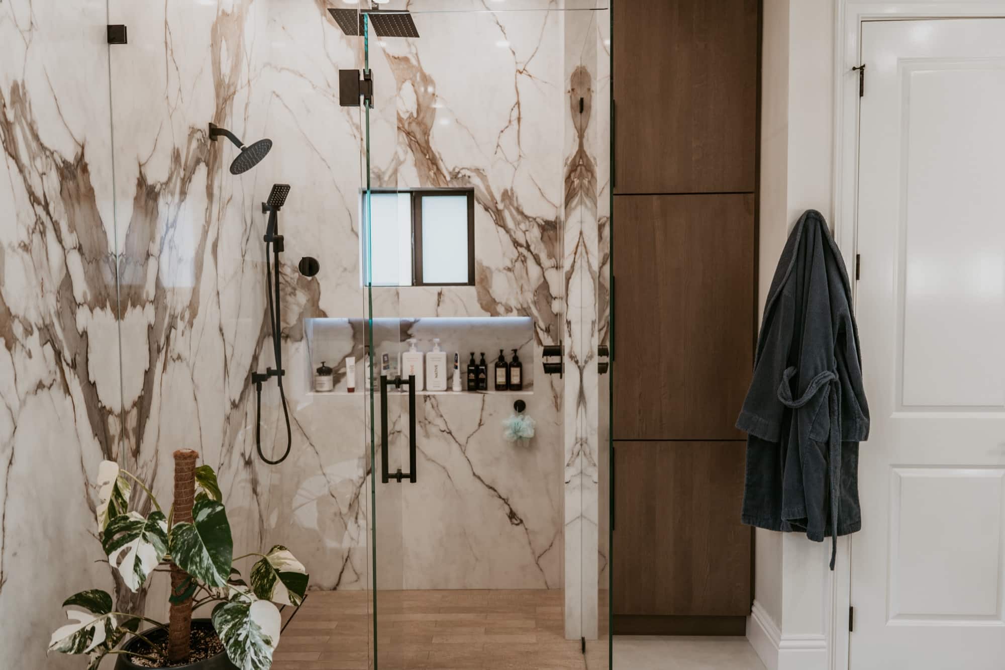 Bath: shower & storage tower. Alliance Construction remodel, Southwest Florida