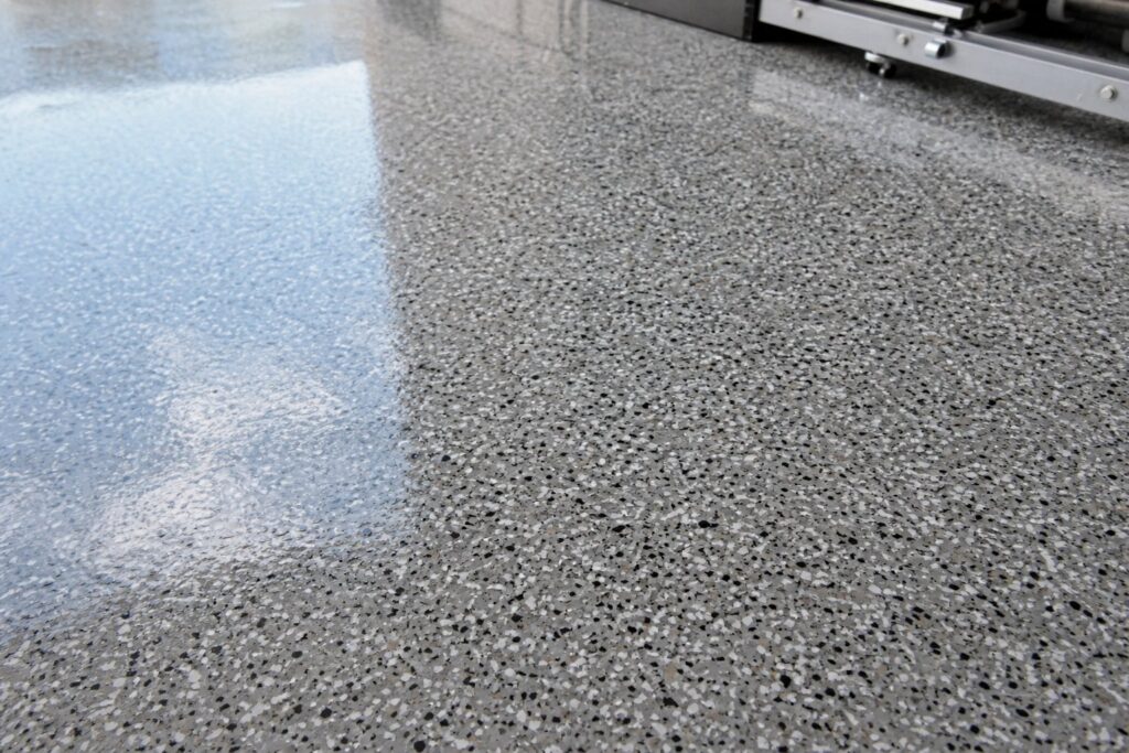 Close-up of an epoxy floor with decorative flake finish