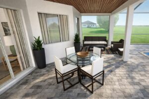 Covered paver patio and pool area in a North Fort Myers backyard