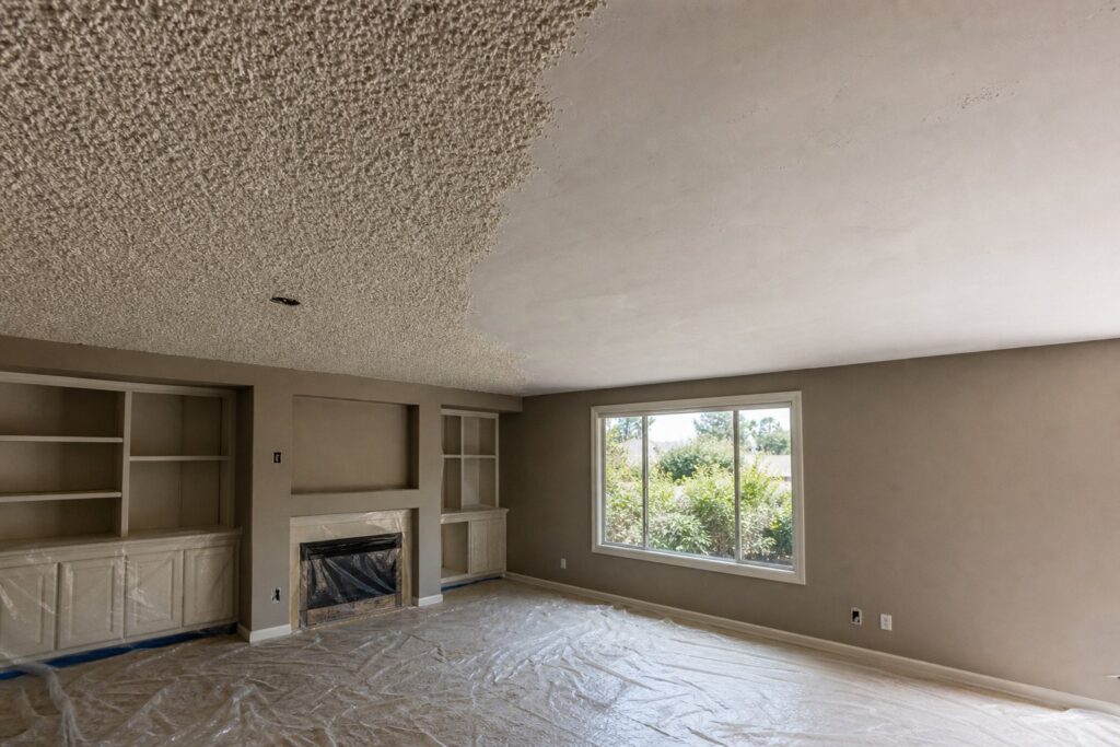Freshly finished smooth white ceiling with crown molding in a bright Florida living room