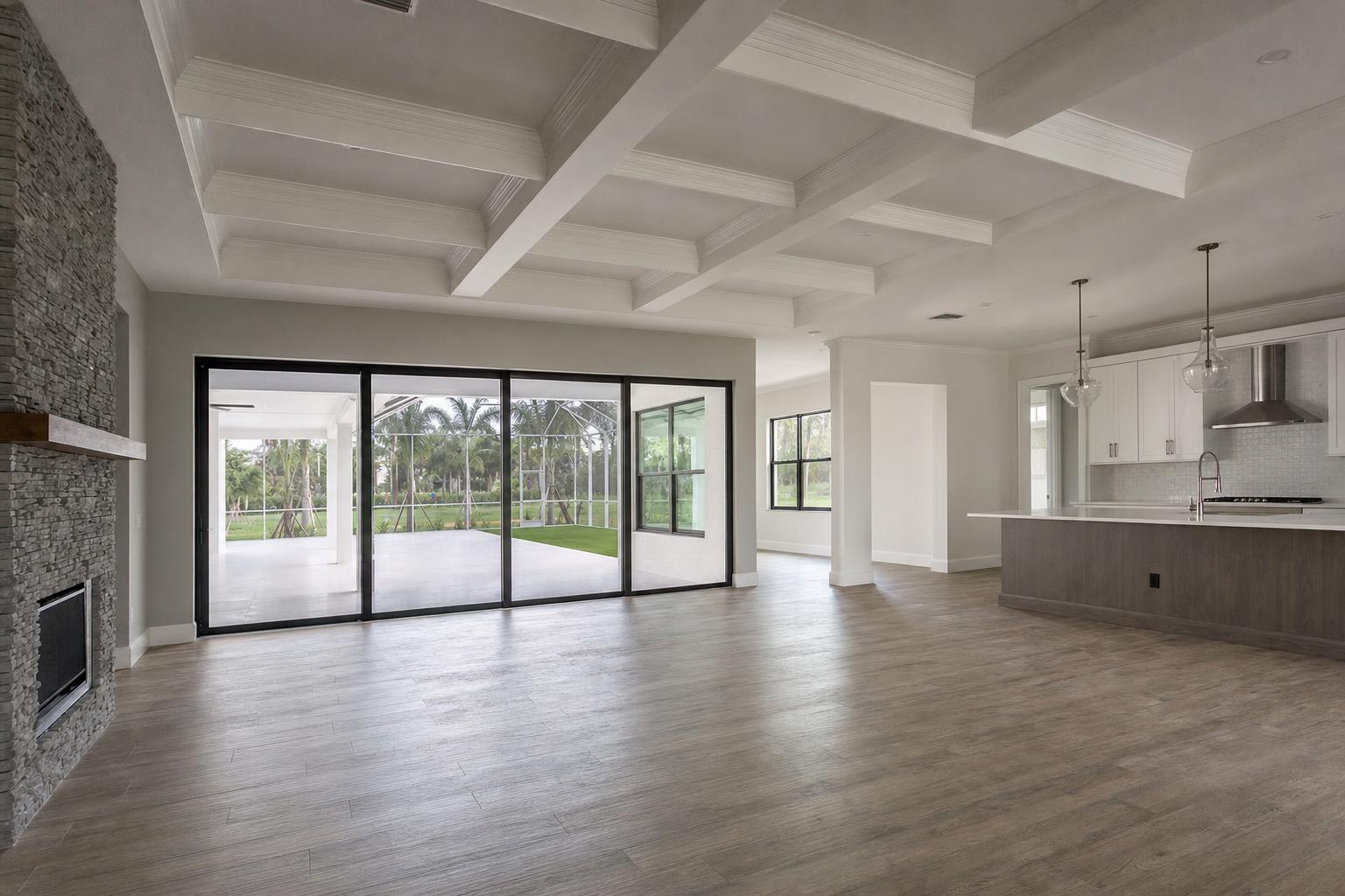 White coffered ceiling with evenly spaced beams in a Bonita Springs great room