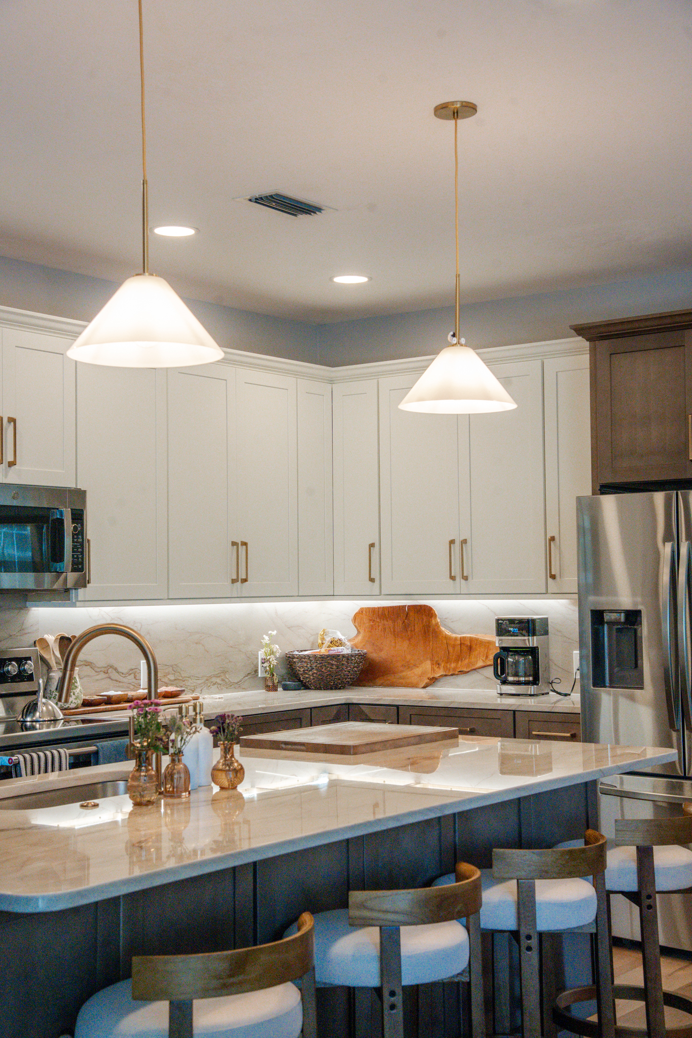Kitchen island with seating in a completed Southwest Florida remodel
