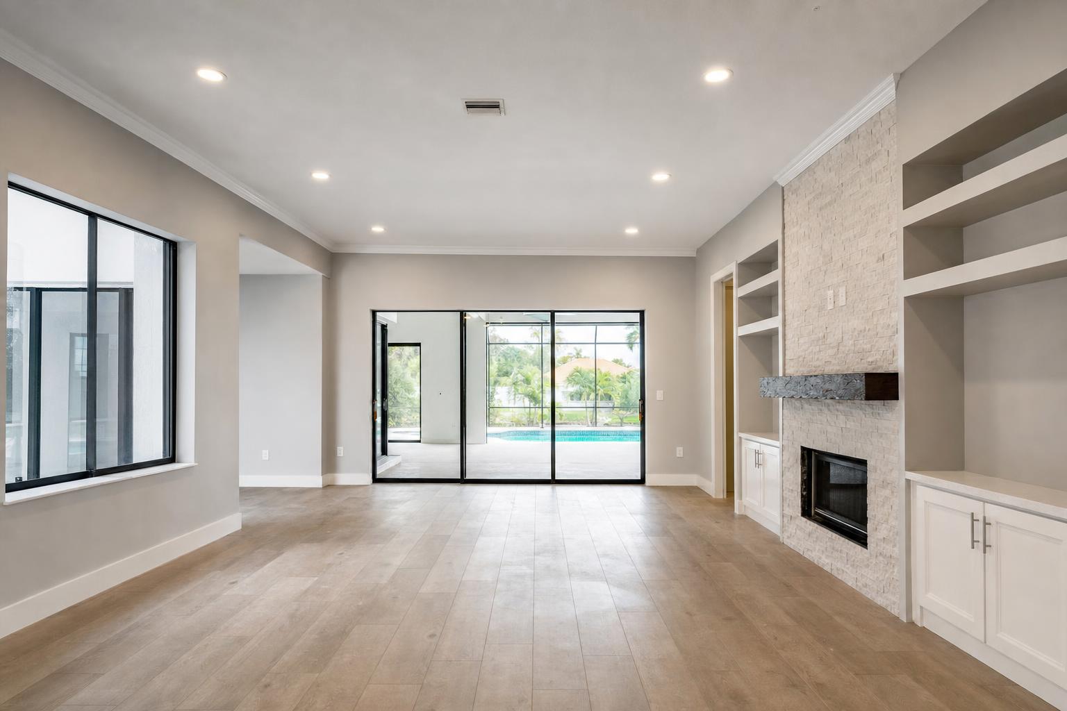 Recessed lighting evenly arranged across a remodeled Fort Myers living room